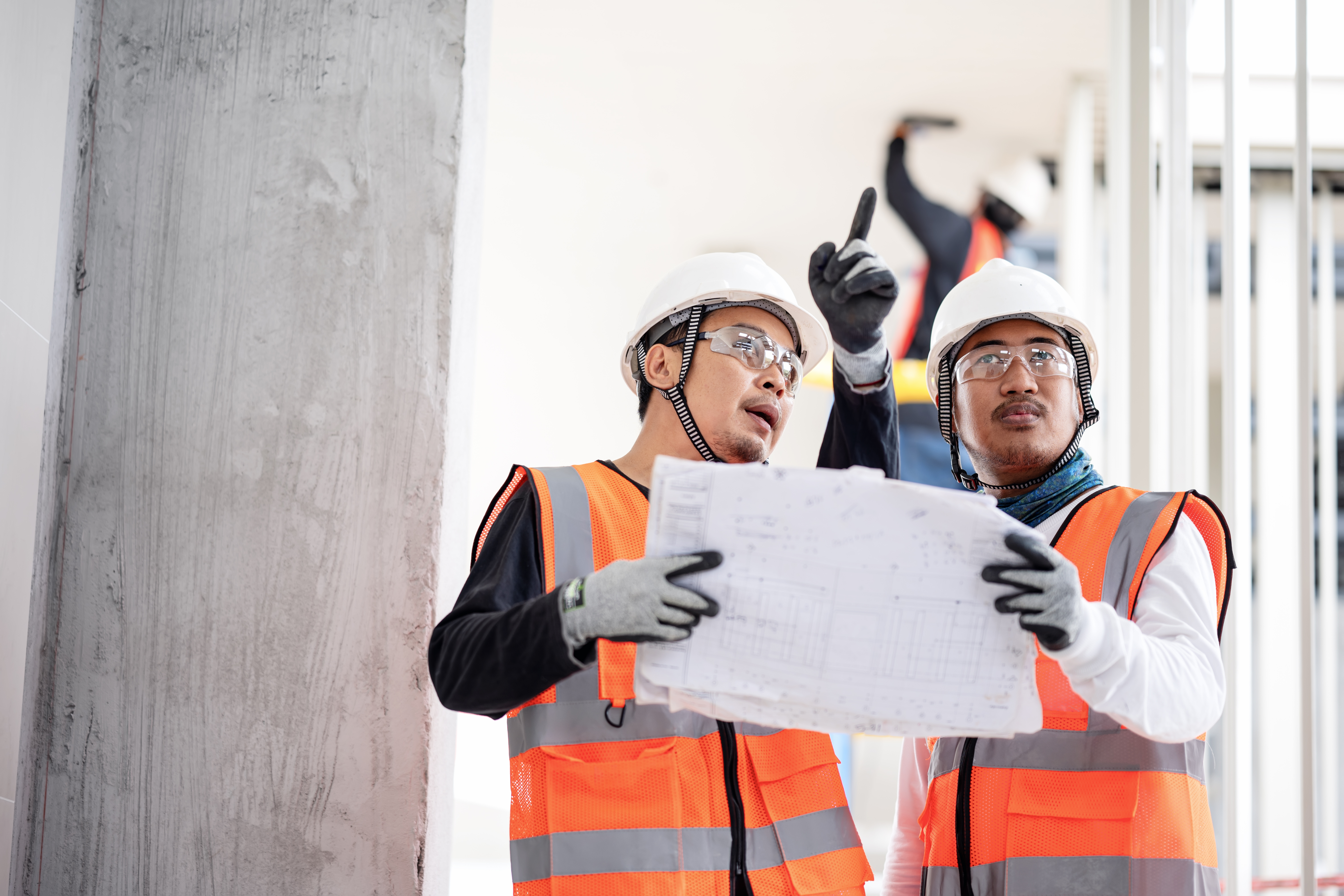 Group of workers cleaning windows service